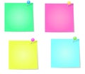 A set of four colored paper notes with pins. Royalty Free Stock Photo